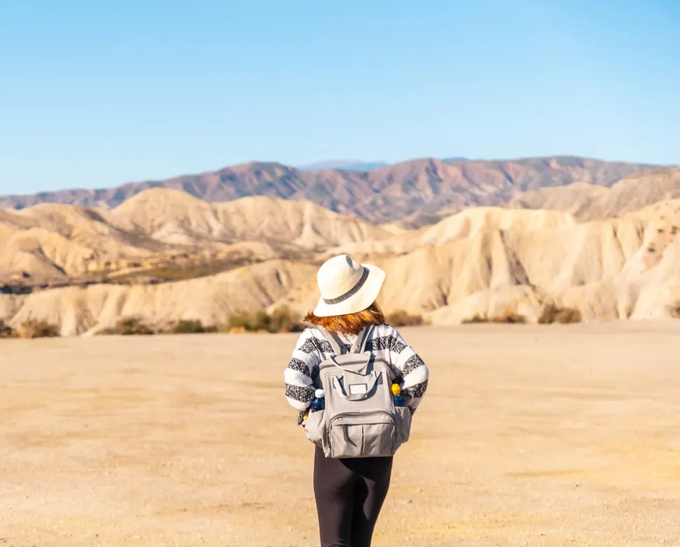 Woman walking in the desert