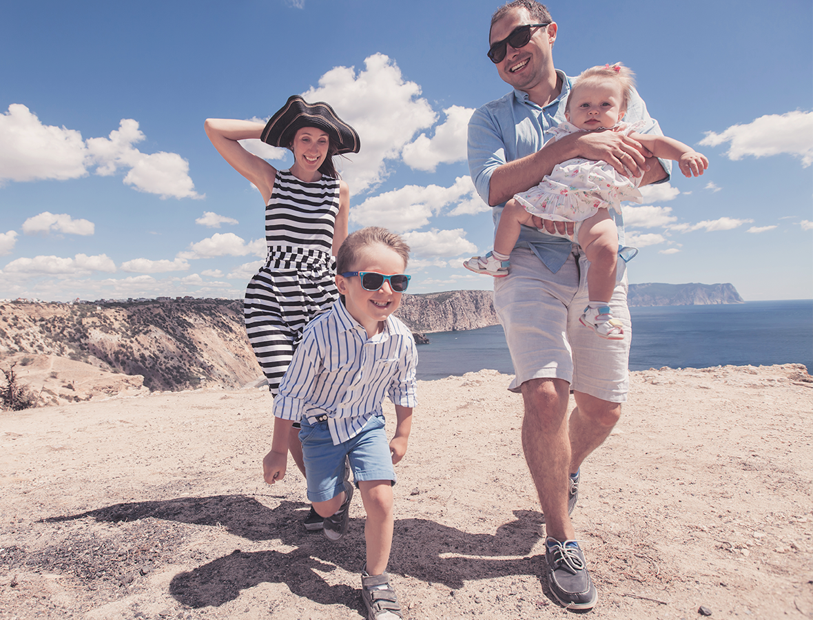 Family walking on a beach