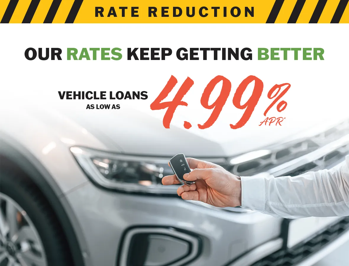 Our Vehicle Loan Rates Keep Getting Better; hand holding key to car