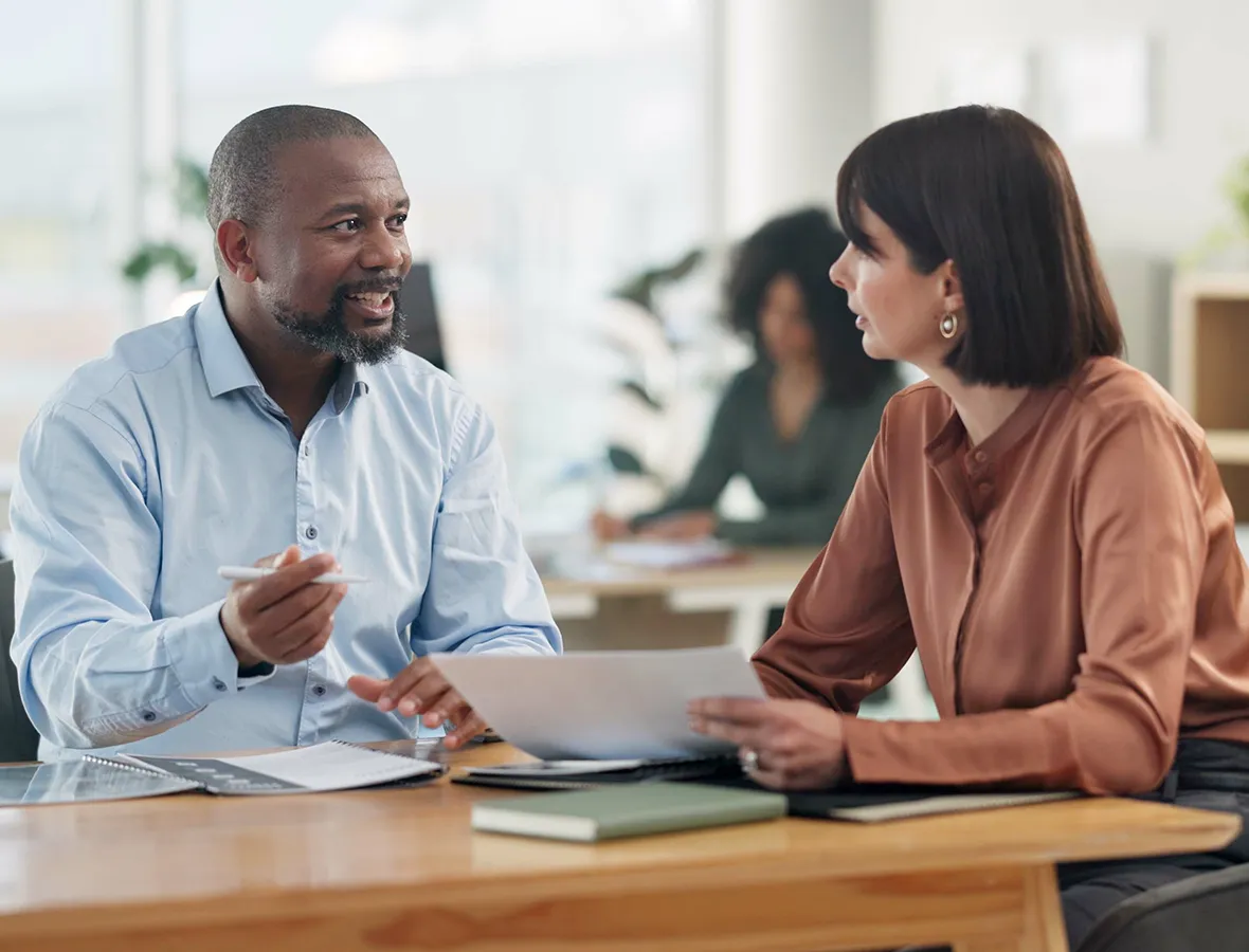 Gentleman speaking with Financial Advisor