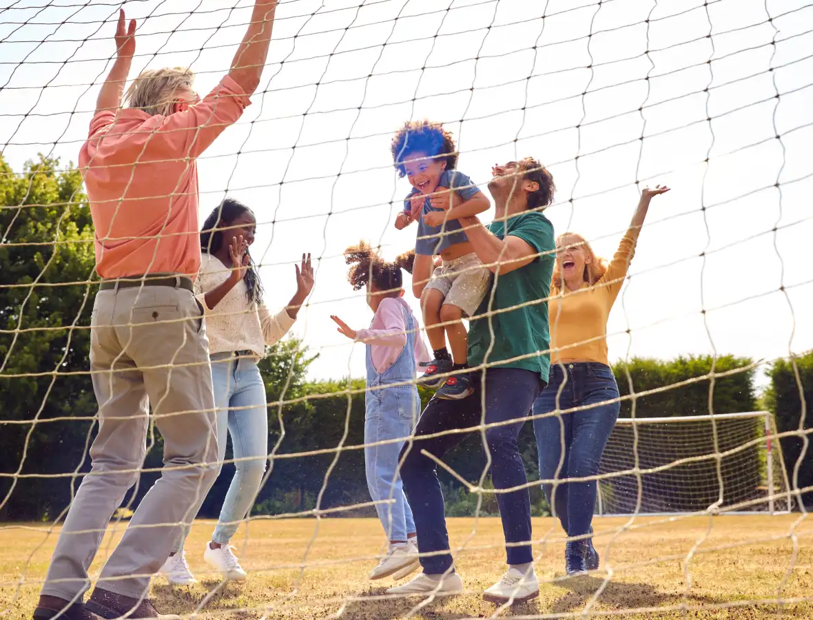 family playing volleyball