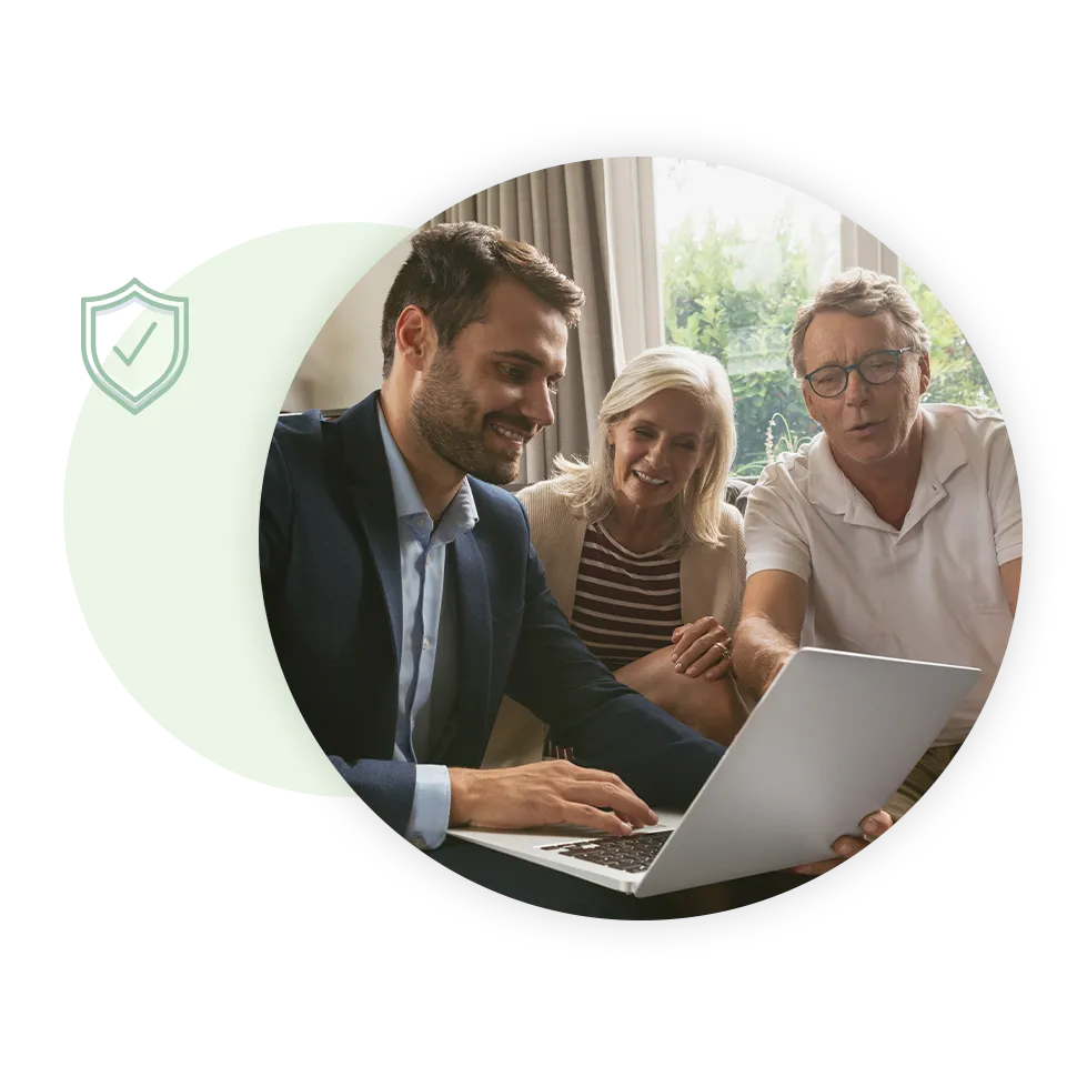 Older couple speaking with Financial Advisor