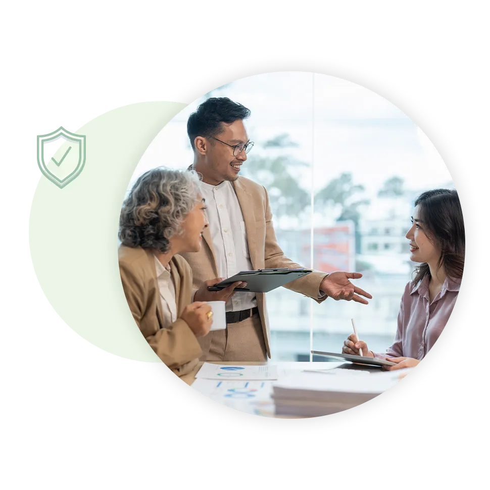 Couple speaking with Financial Advisor