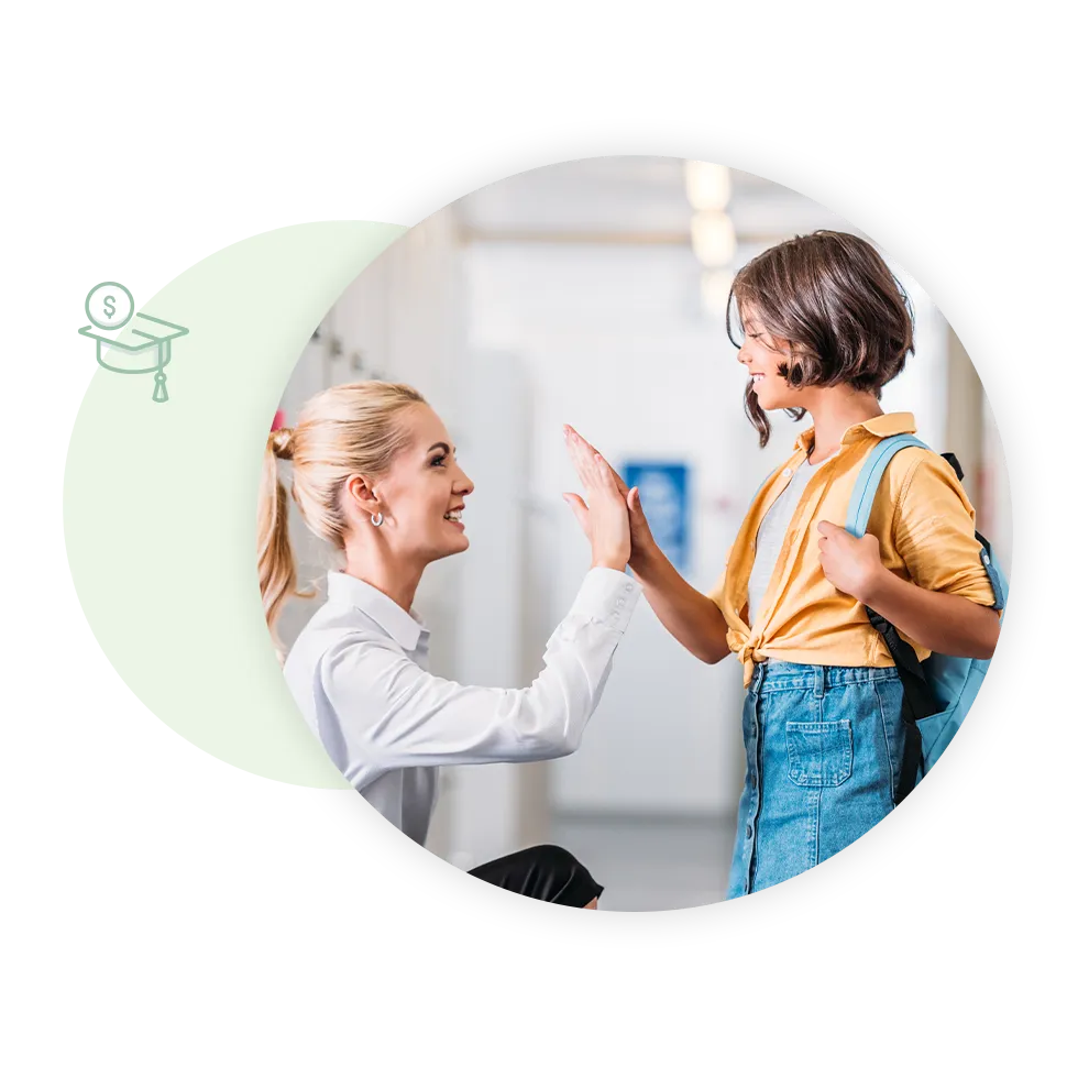 teacher high-fiving student