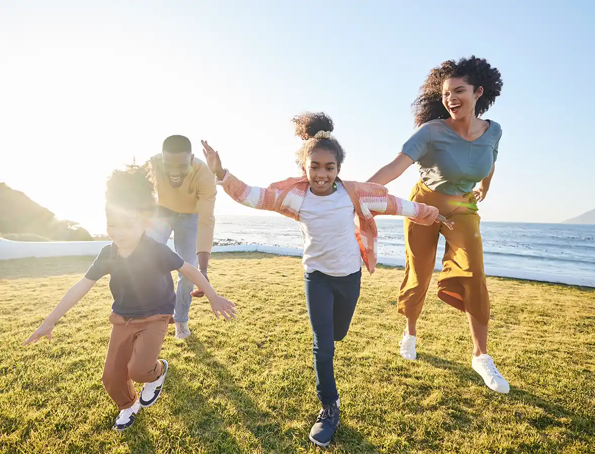 family playing in the park