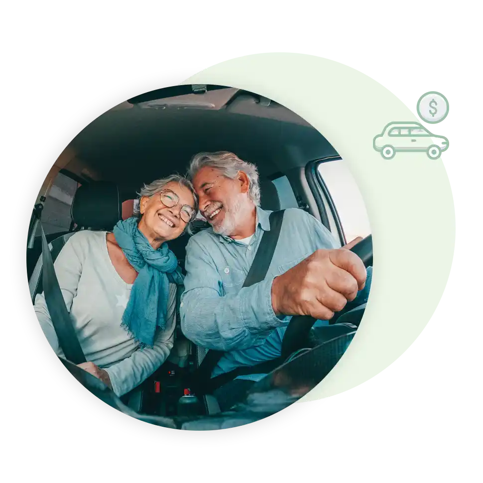 retired couple laughing while they drive